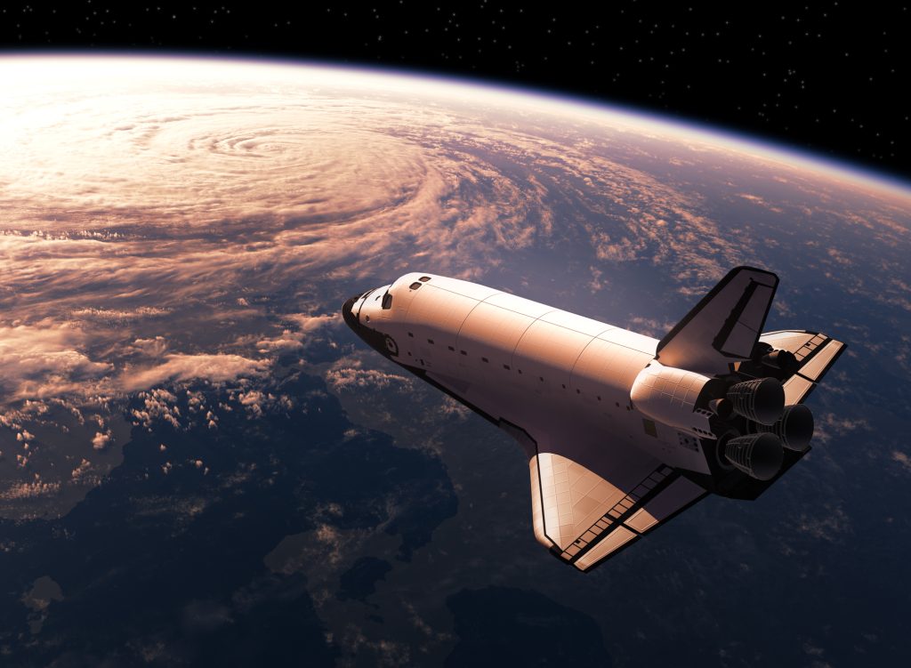 Space shuttle overlooking earth