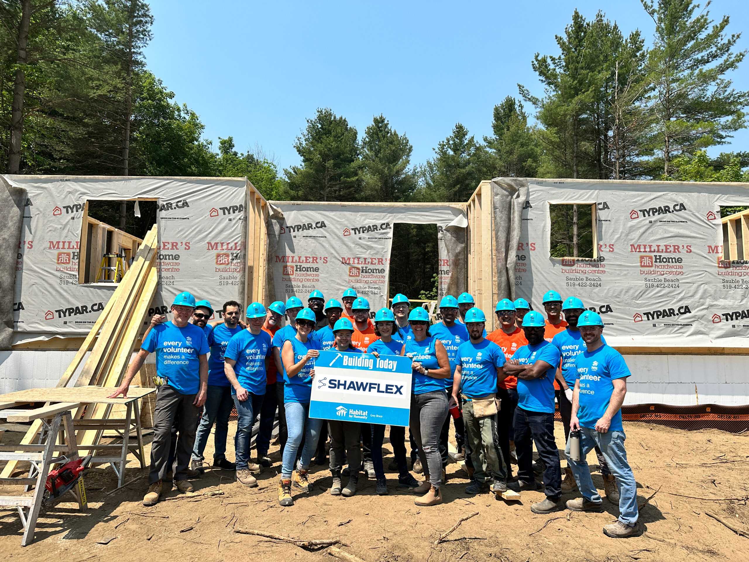 Team Shawflex building homes with Habitat for Humanity Shawflex